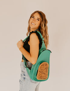 The Melleville Turquoise Sling Bag